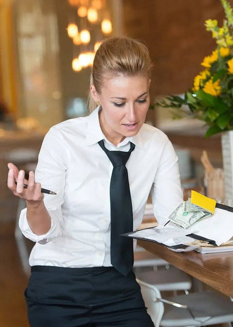 Unlike Check presenters, the Waiter Wallet was for organizing servers, not dropping checks..